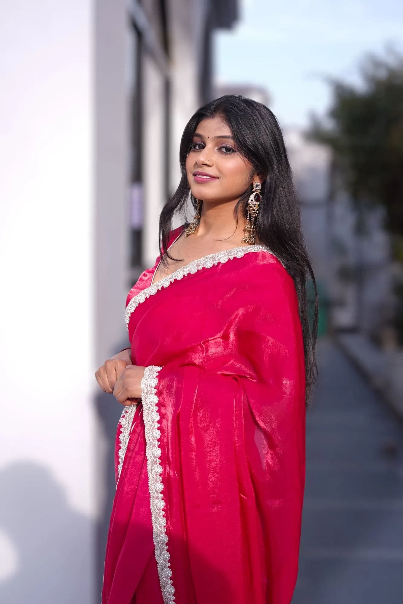 Bright pink saree with white lace border 2