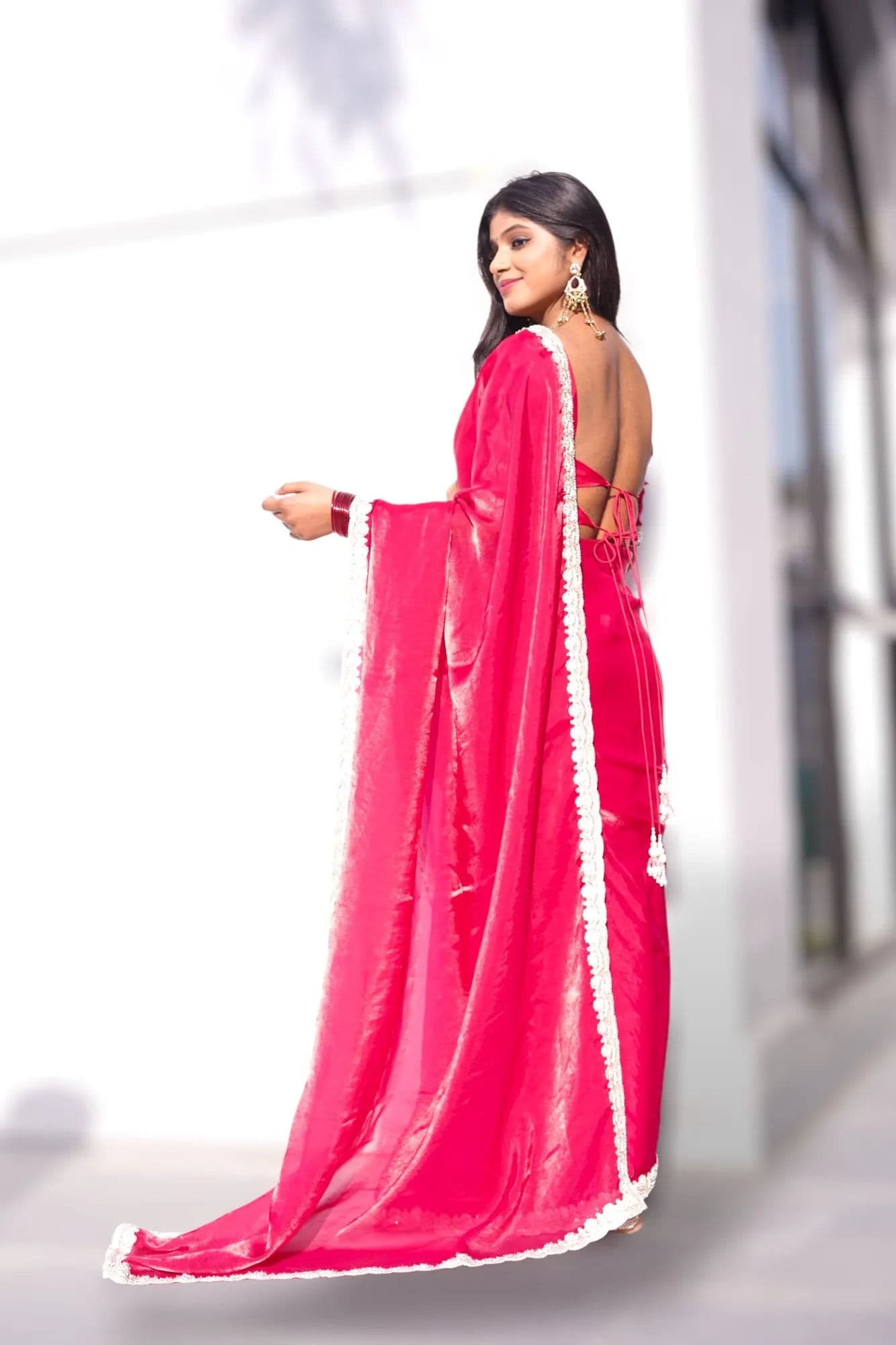 Bright pink saree with white lace border 4